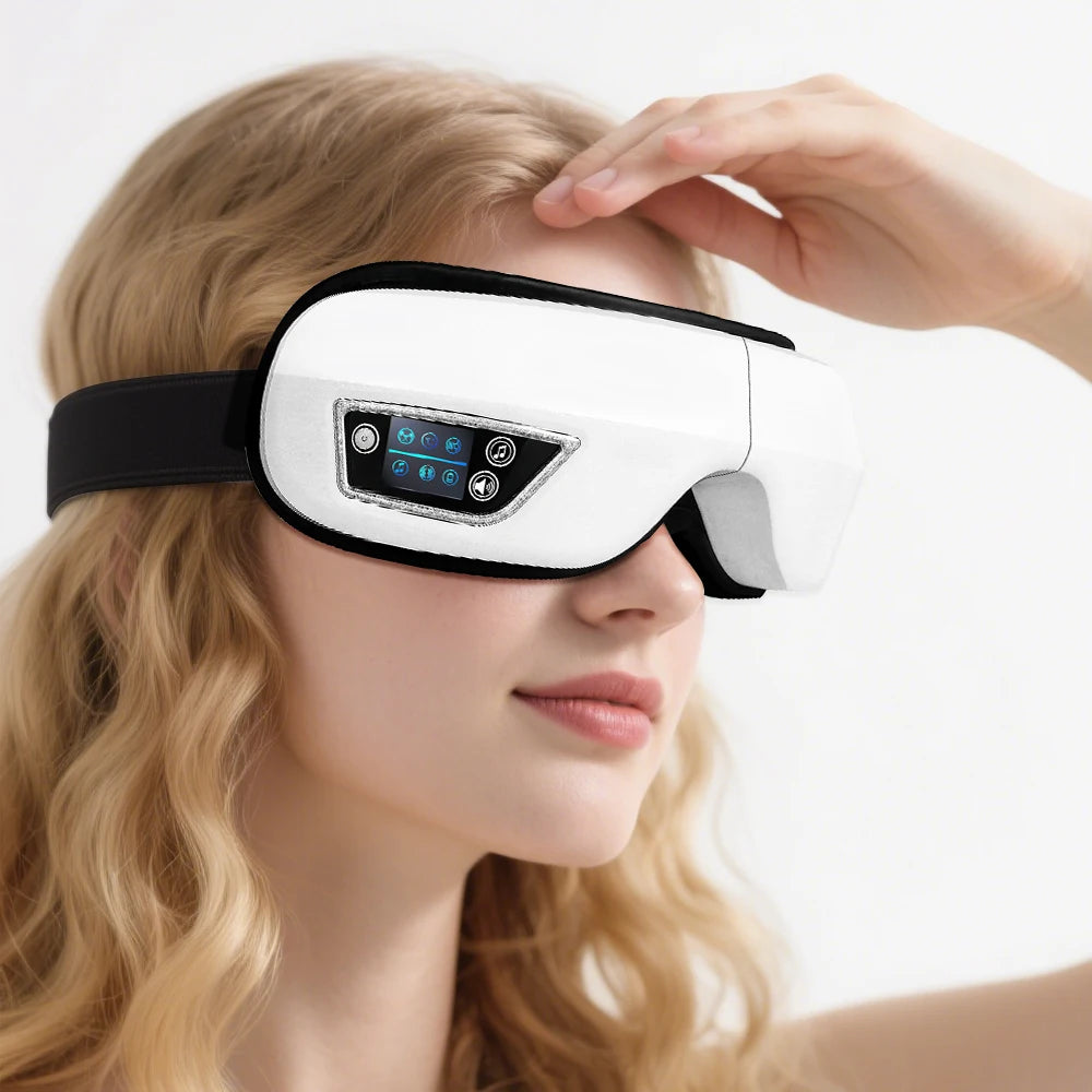 Woman wearing a white and black eye mask with digital display on a light background