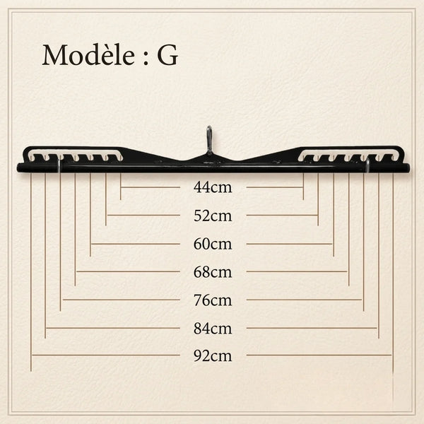 Black hanger with measurement markings on a beige background