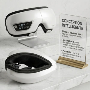 White and black helmet with a stand on a marble surface, accompanied by a sign in French.